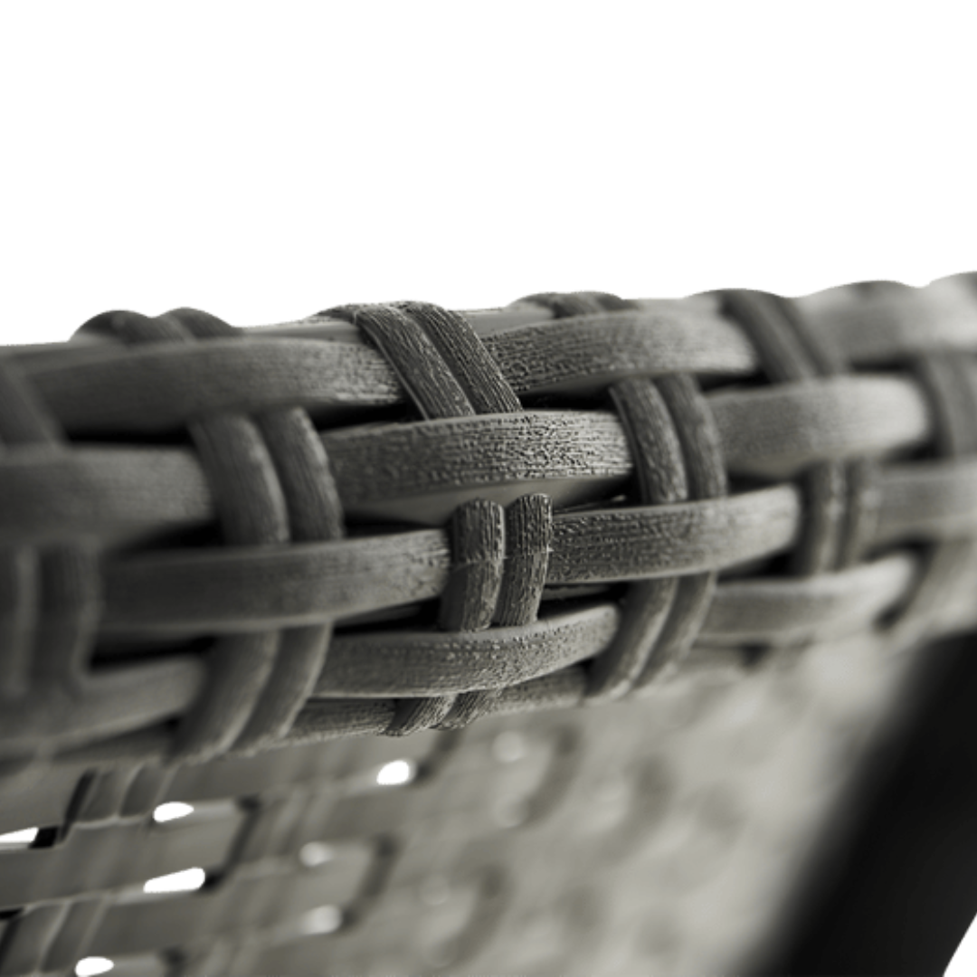 Rio Patio Set in graphite with a close-up view of its durable woven-look plastic resin texture