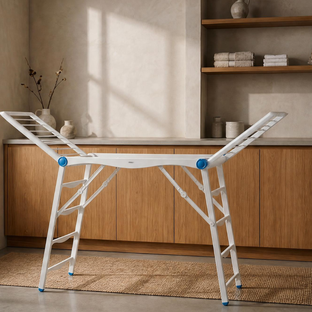 Clothes Drier in white plastic resin with a folding frame and multiple rails for indoor laundry drying
