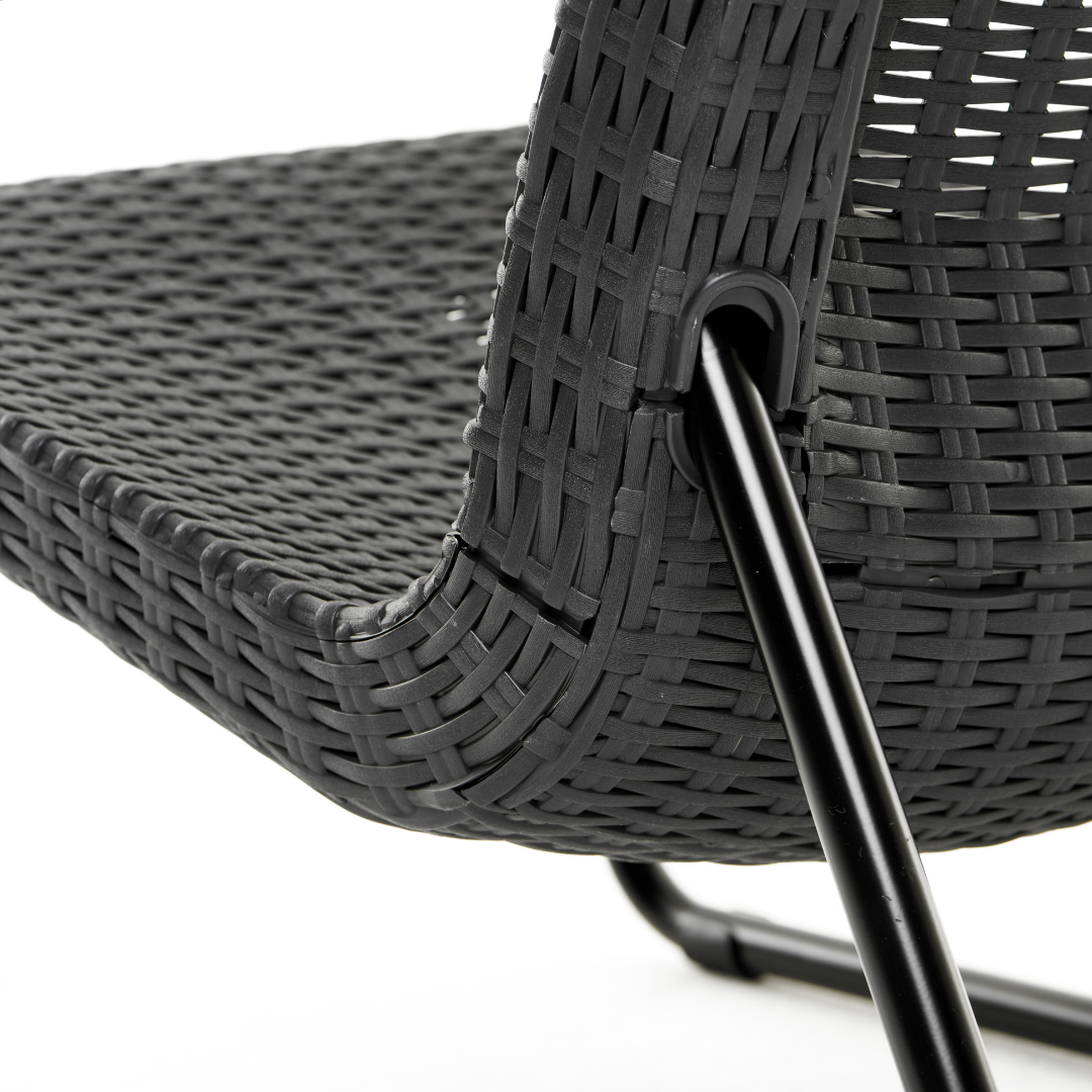 Rio Patio Set in graphite plastic resin with a wicker-look texture and sturdy black legs shown in close-up