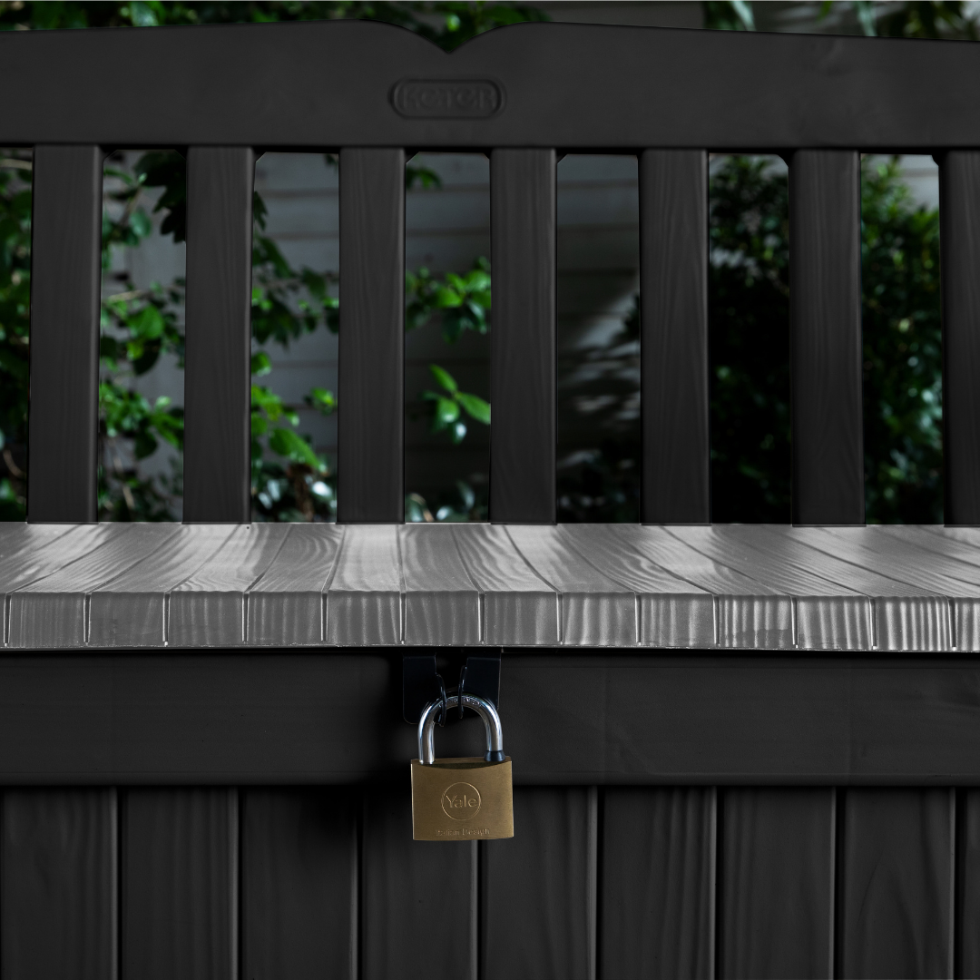 Eden 70G Bench Box Graphite with a textured resin finish and padlock securing the storage compartment beneath the seat